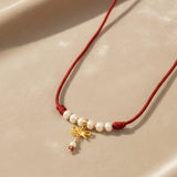 Pearl and Bow Medium Cord Choker