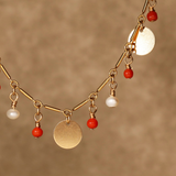 Semi precious coral and pearl hanging stones necklace